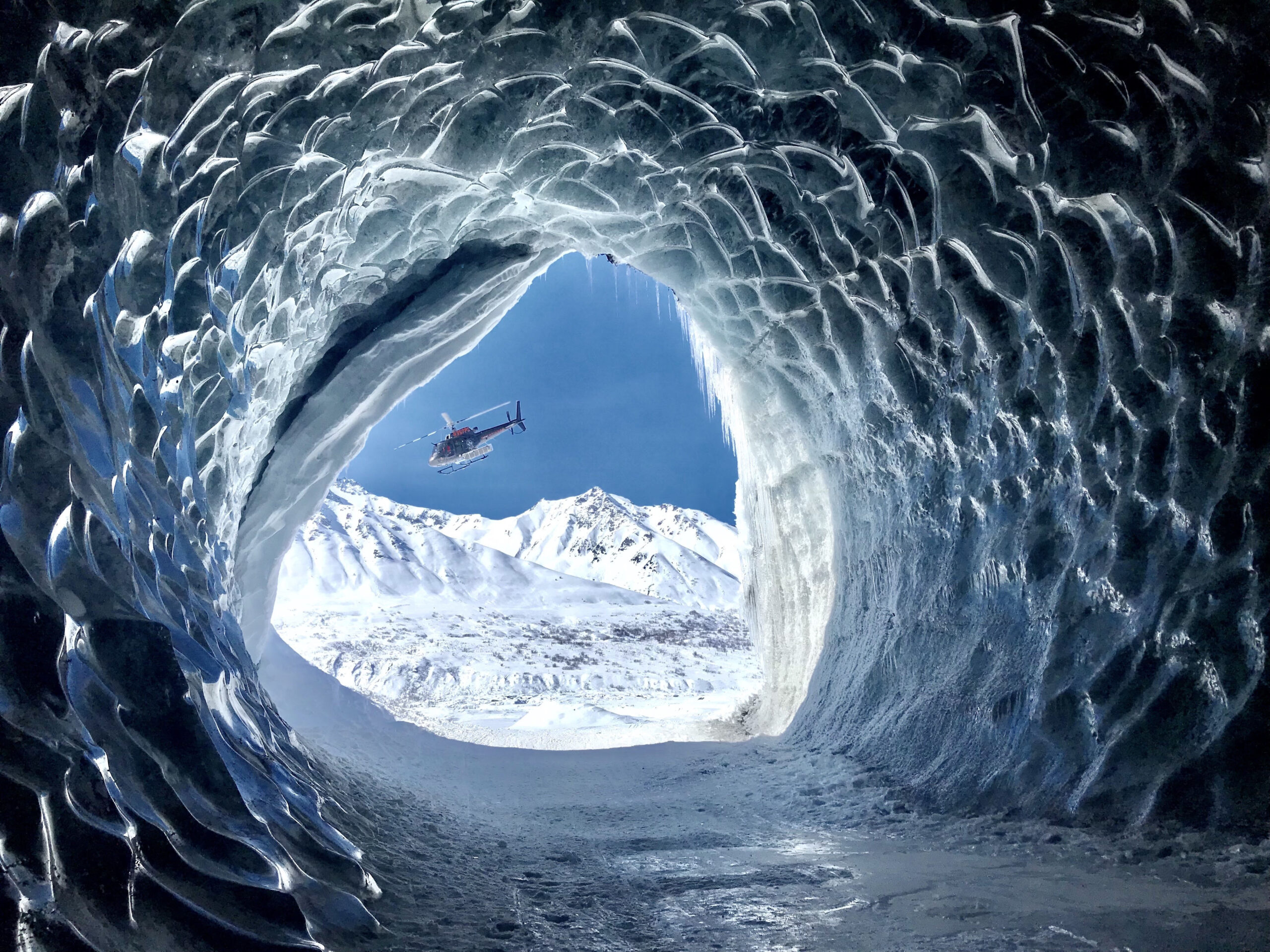 Heli through the Glacier Tunnel